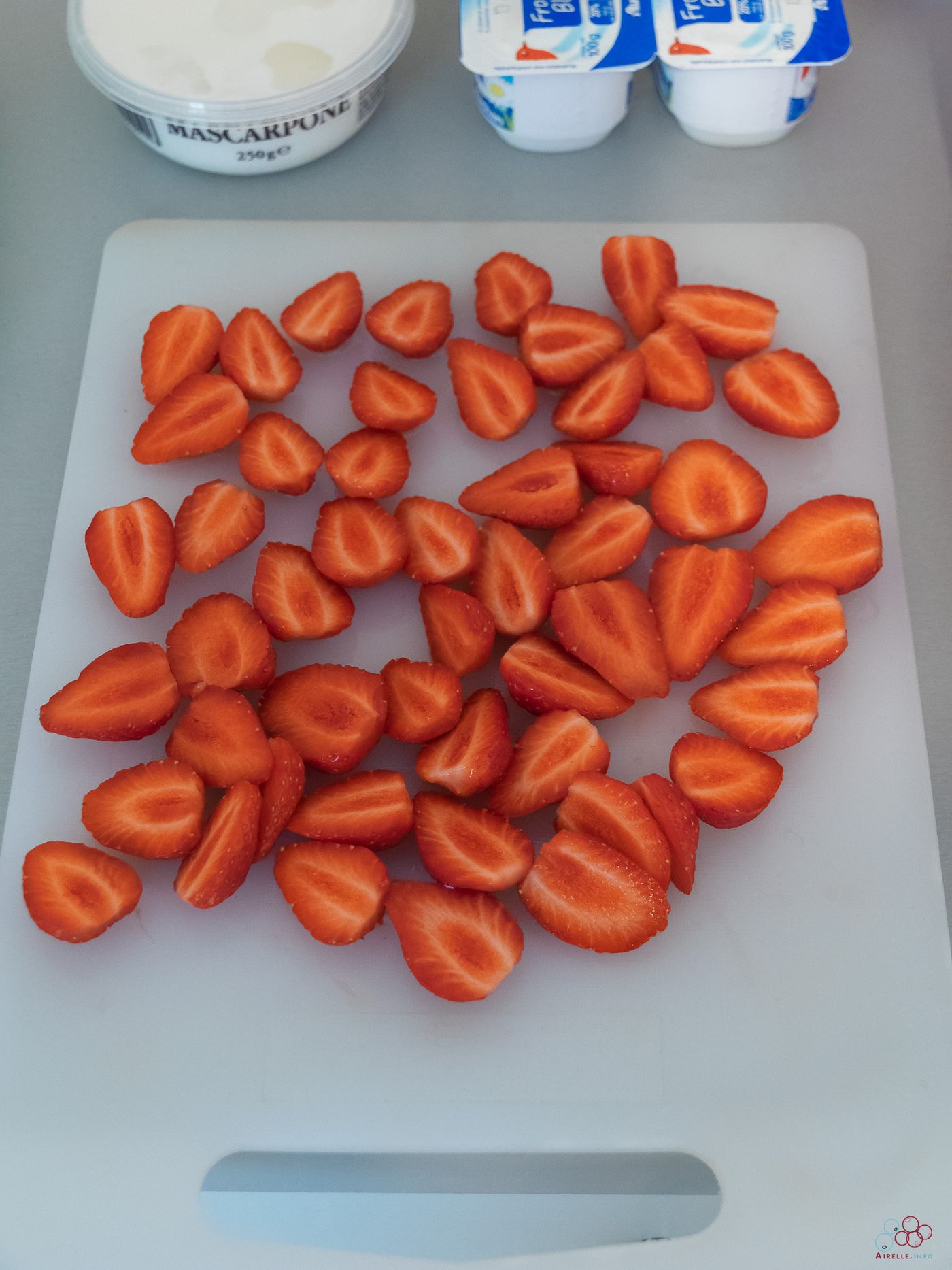 Picture of strawberries cut in half.